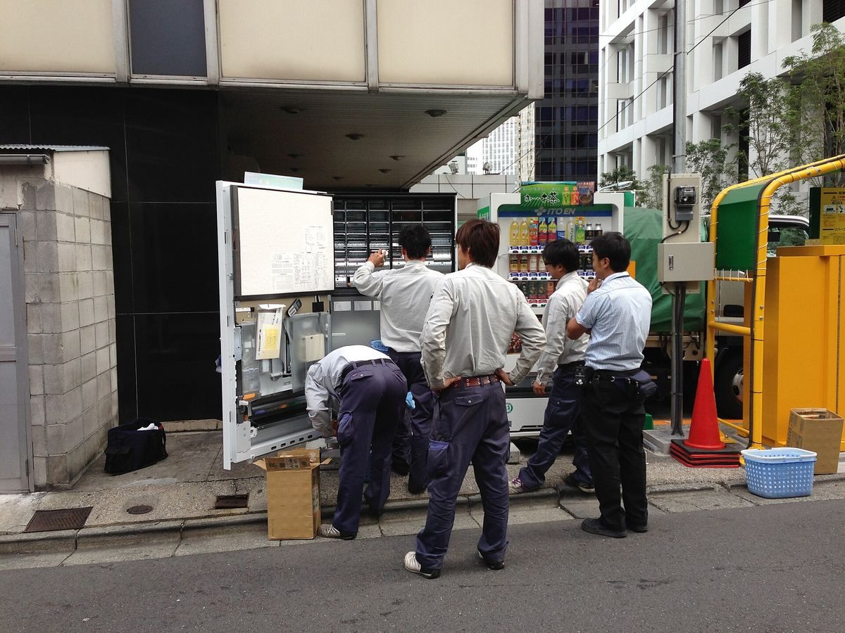 A vending machine being serviced